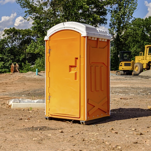 how often are the portable restrooms cleaned and serviced during a rental period in Exira IA